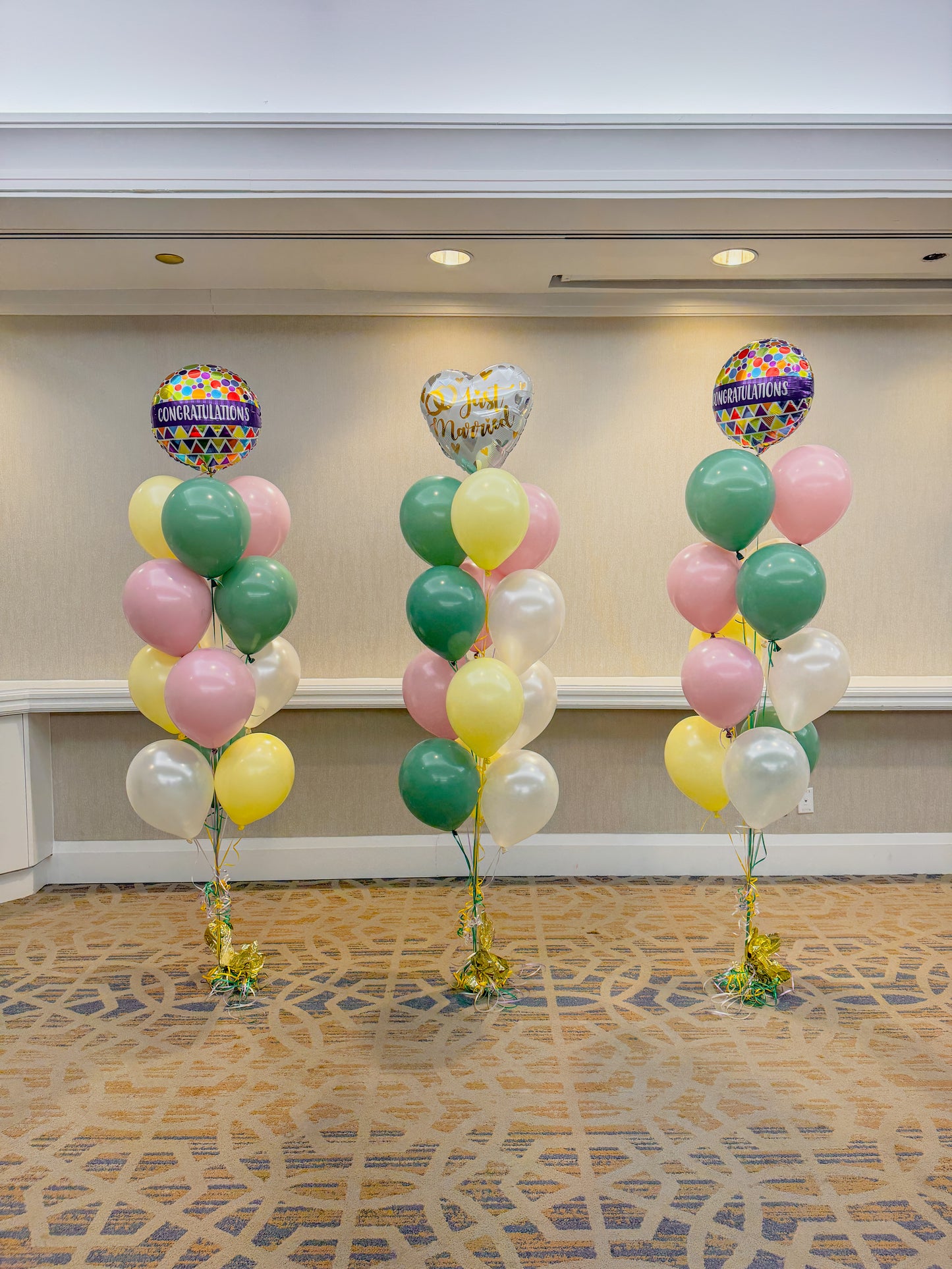 3 sets of helium filled latex paired with one foil on each.