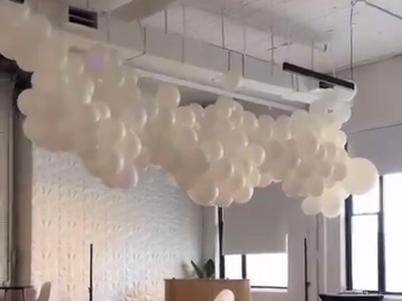 Long glowing hanging white cloud balloons