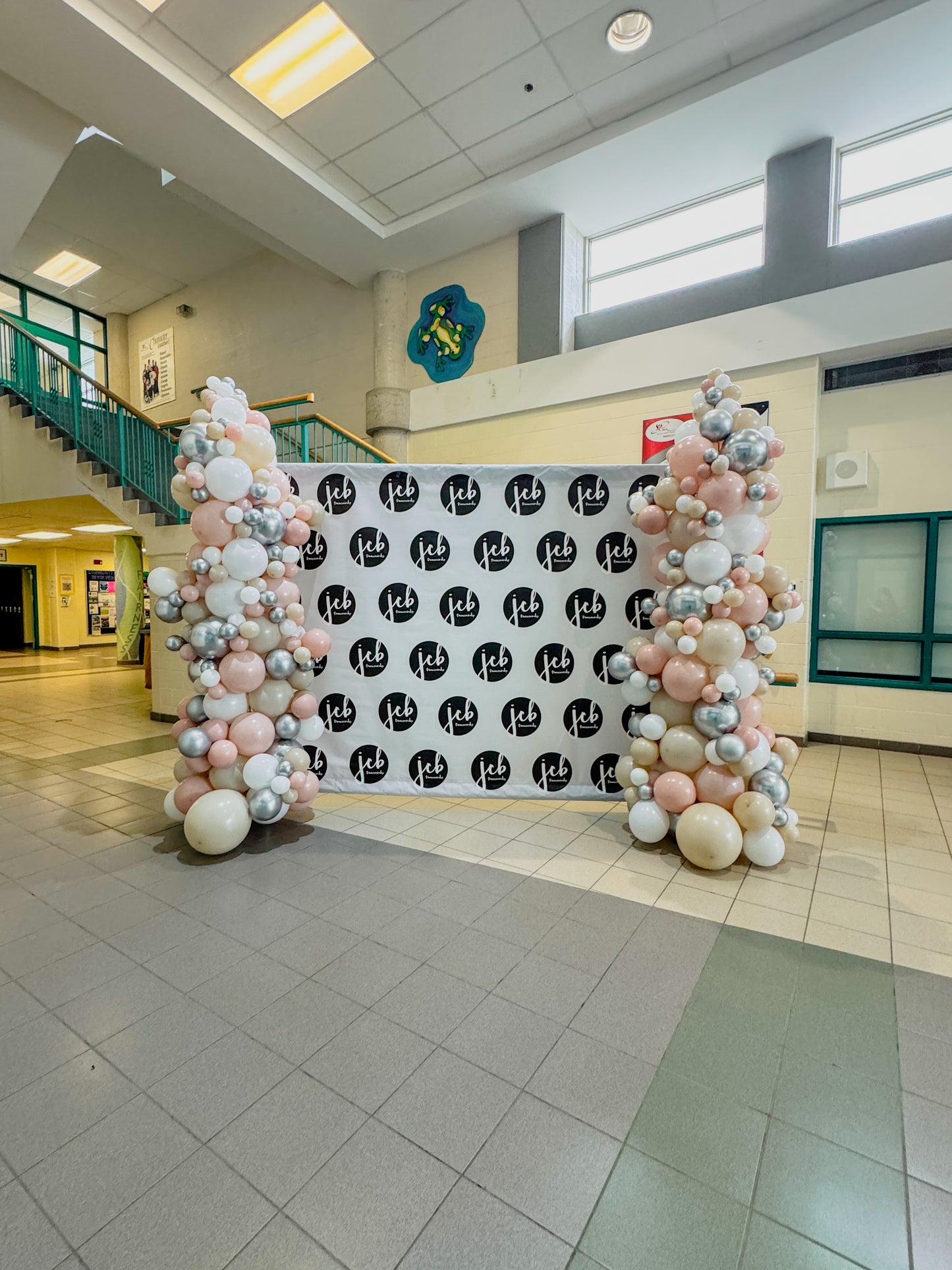 2 sets of 9 feet tall fuller balloon stand along garlands