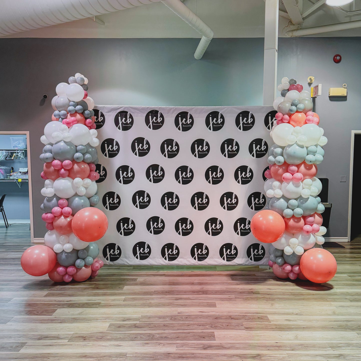 Two tall balloon garlands