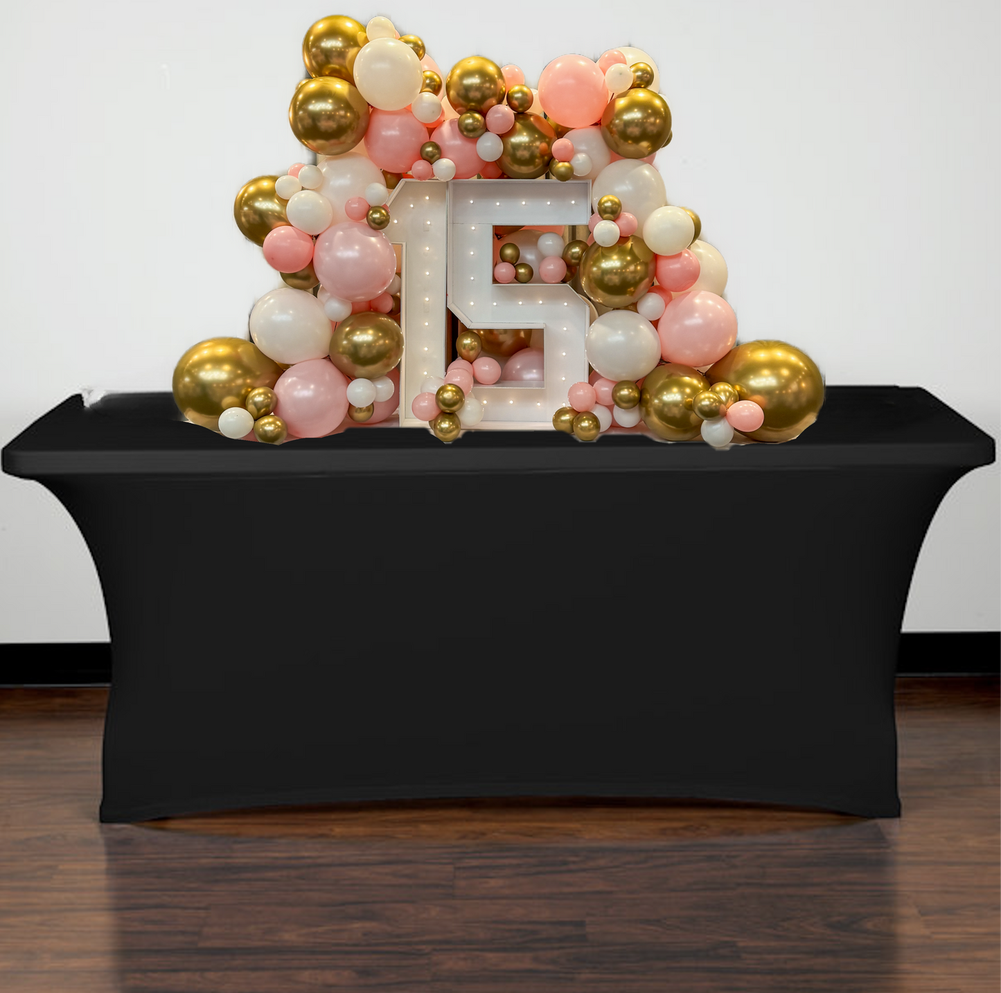 Marquee numbers with 10 feet worth of balloons on a table