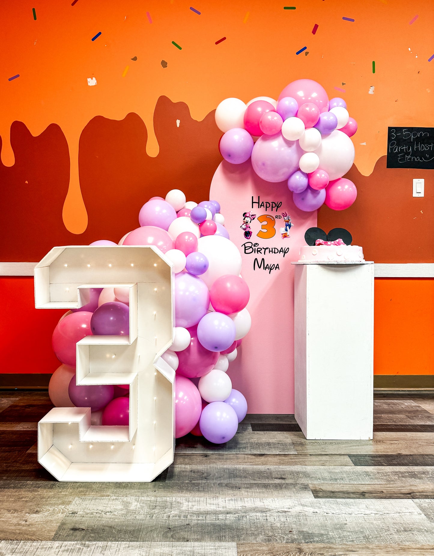 Mini solid backdrop with cake stand and light up number