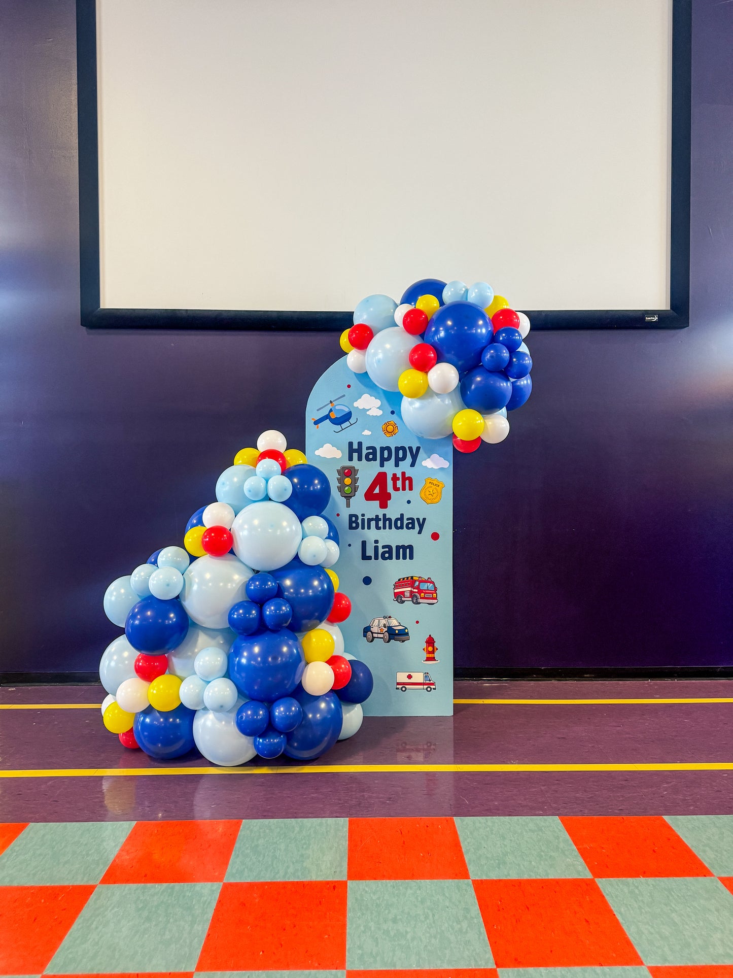 Mini solid balloon display with lots of images on the board