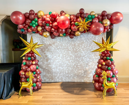 Vinyl Backdrop with 10 foot balloon garland & two balloon Christmas trees