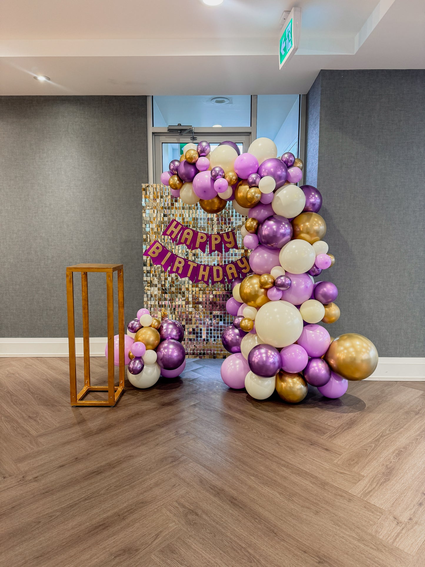 5.5 Shimmer Wall with Balloons, banner and cake stand