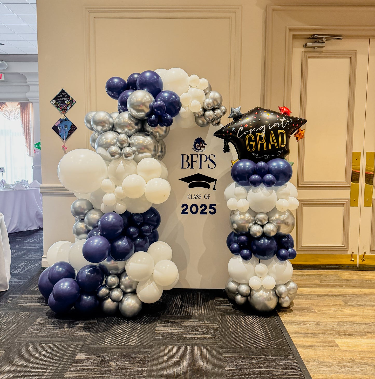 Large solid balloon backdrop with side balloon pillar