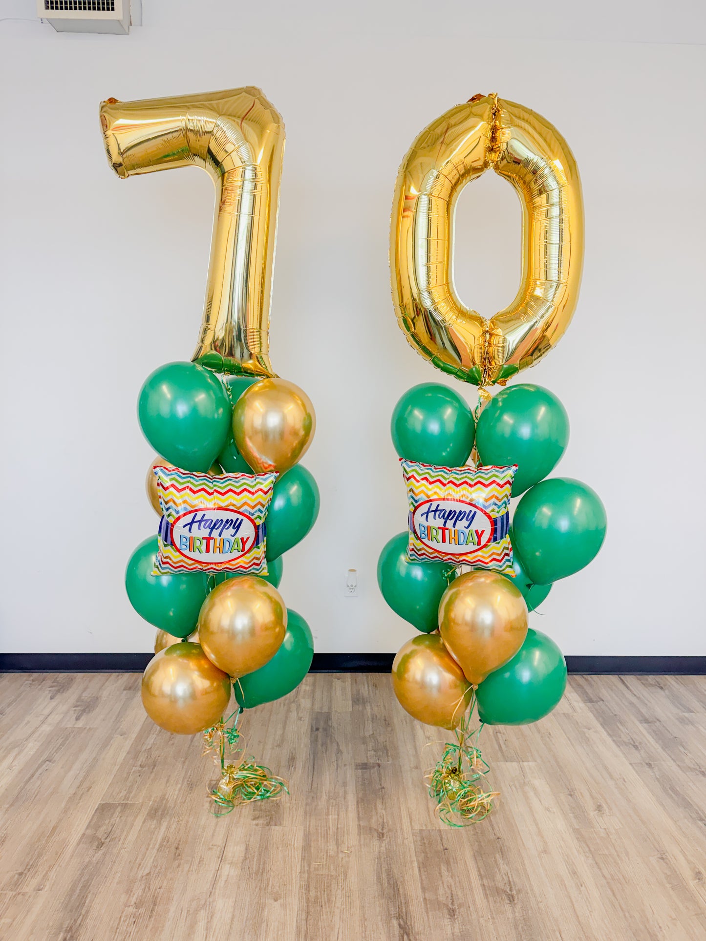 Two aged helium balloon trees