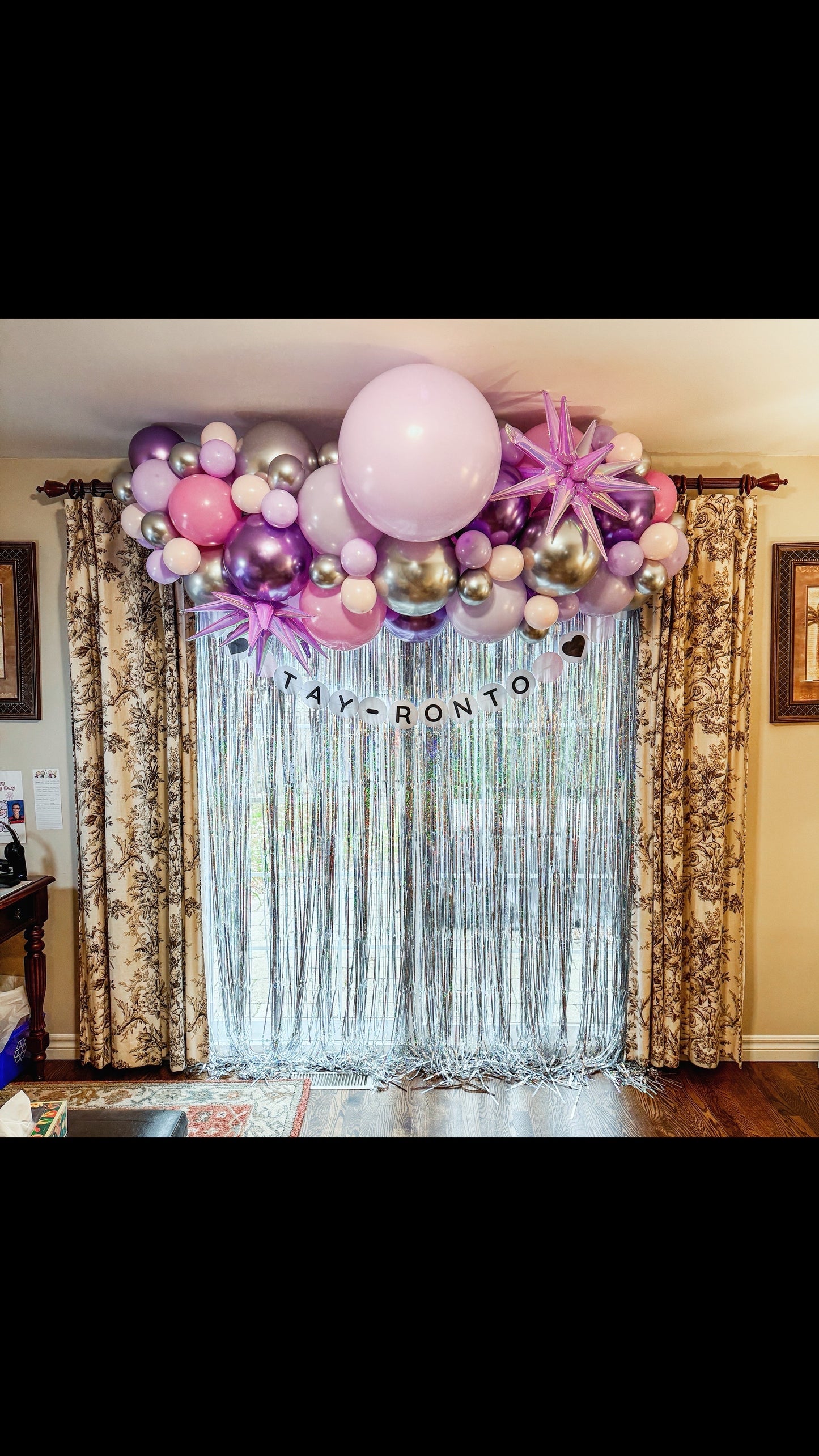 6 foot long balloon garland with 2 star foils