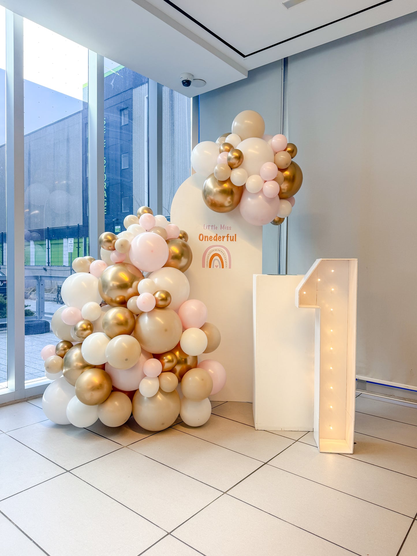 Mini solid backdrop with cake stand and light up number