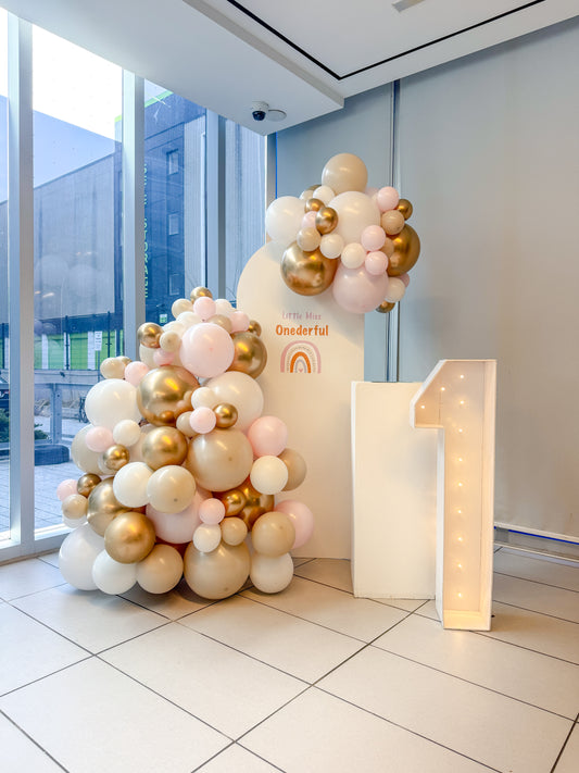 Mini solid backdrop with cake stand and light up number