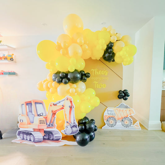 Construction themed large solid balloon backdrop.