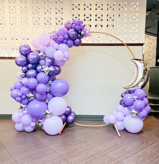 7.5 foot arch with balloons & foil moon & stars