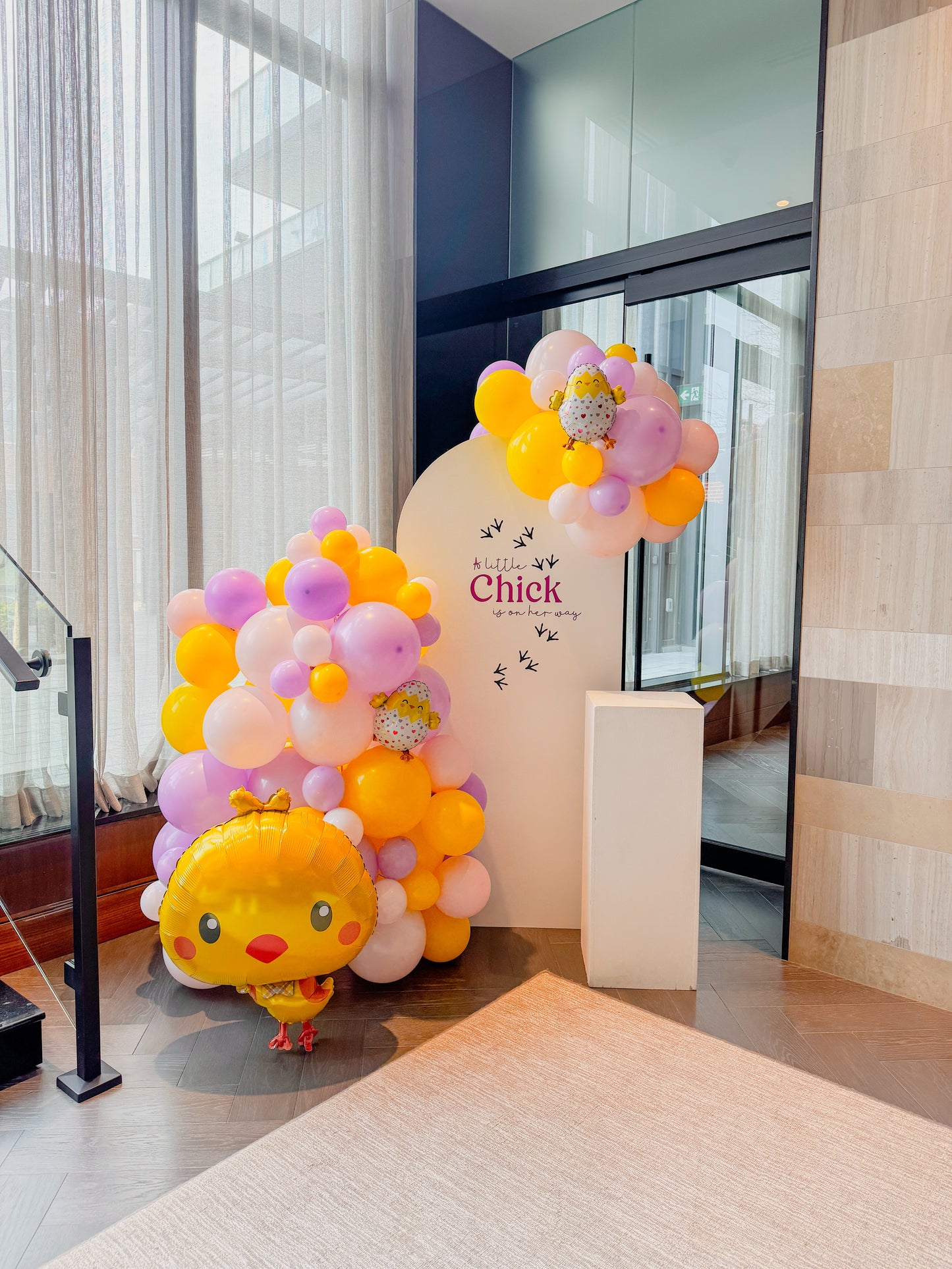 Middle Solid Backdrop with solid wood cake stand and foil balloon accents