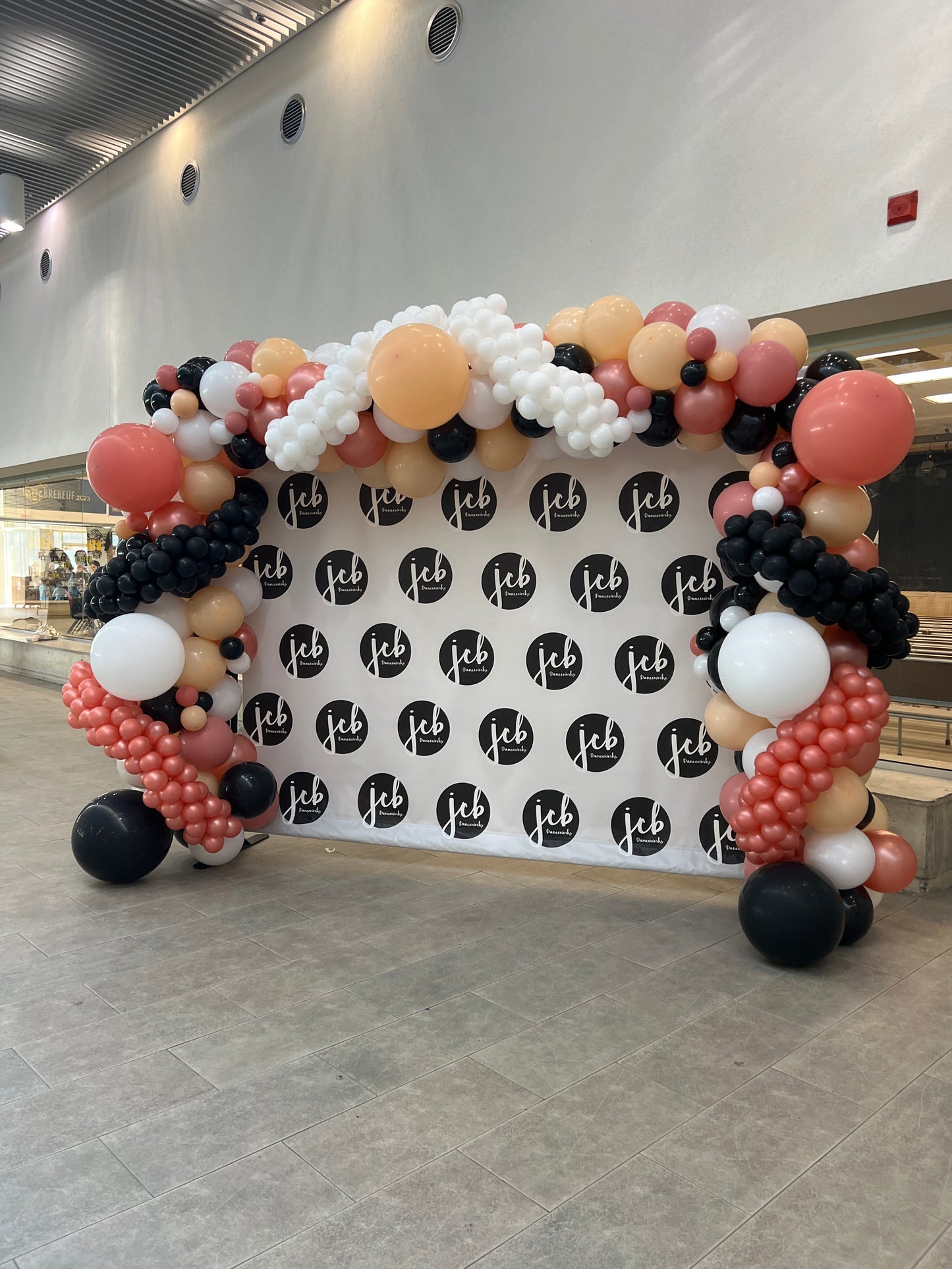 20 foot garland, grape balloon accents & backdrop.