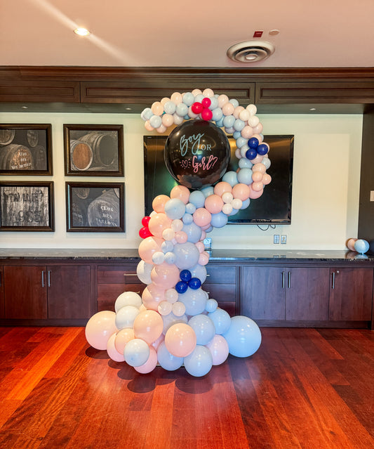 Gender reveal question mark arch