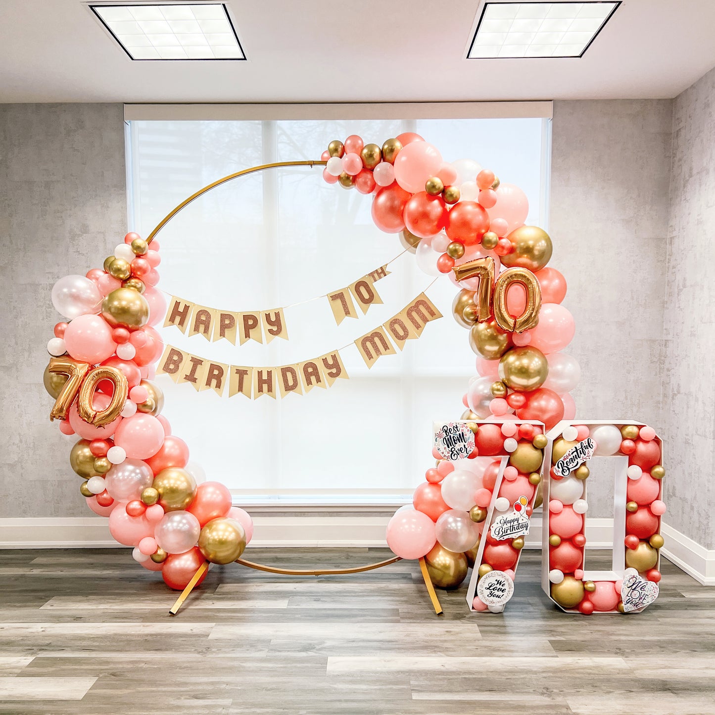 Round balloon arch option A with banner, foil numbers and balloon filled numbers