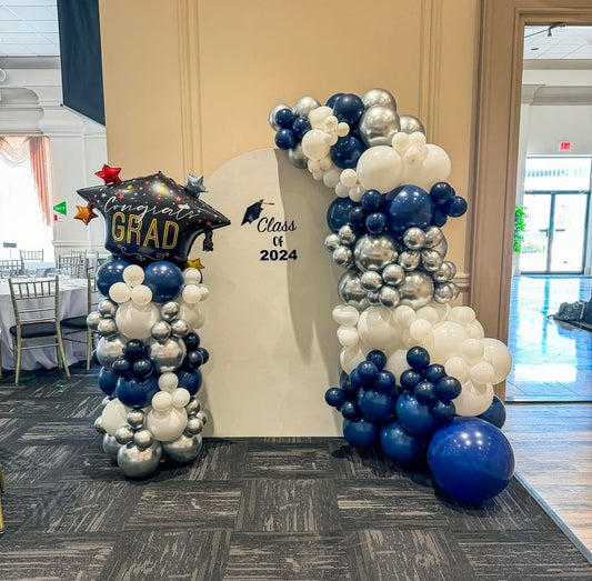 Large solid balloon backdrop with side balloon pillar