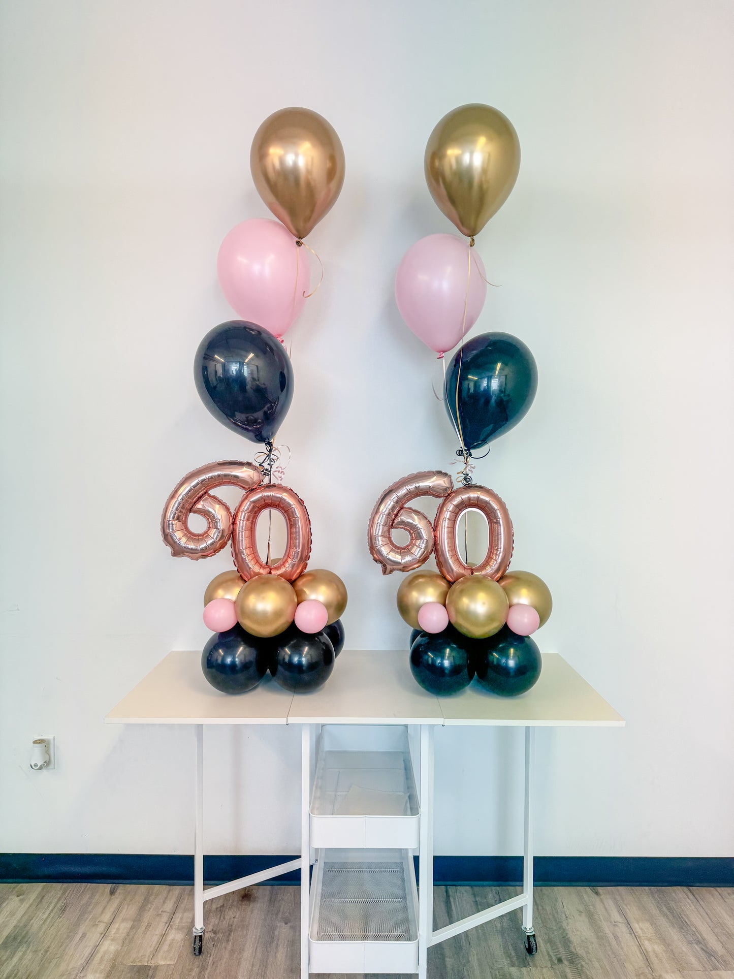 Table top aged balloon bouquet with 3 helium balloons.