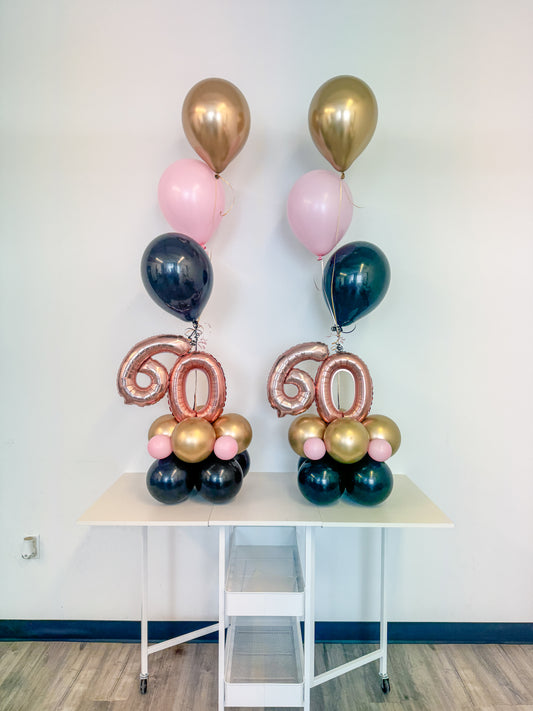 Table top aged balloon bouquet with 3 helium balloons.