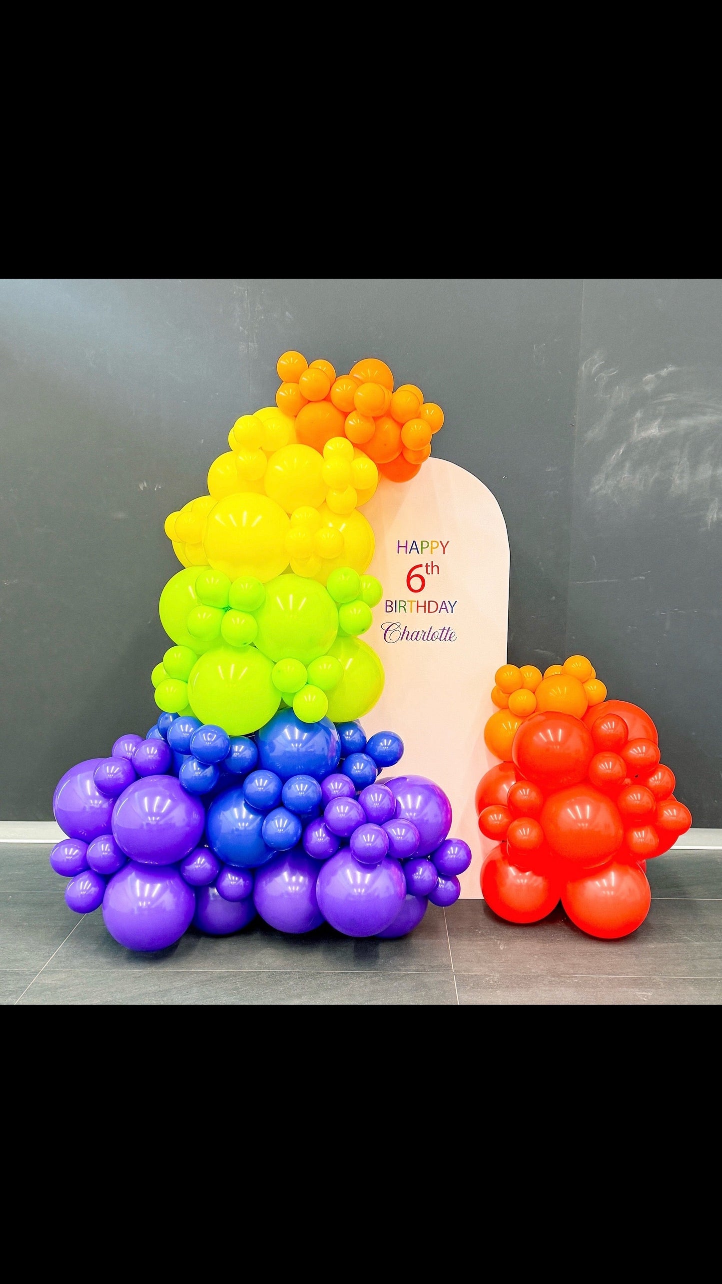 Mini solid backdrop incased in balloons