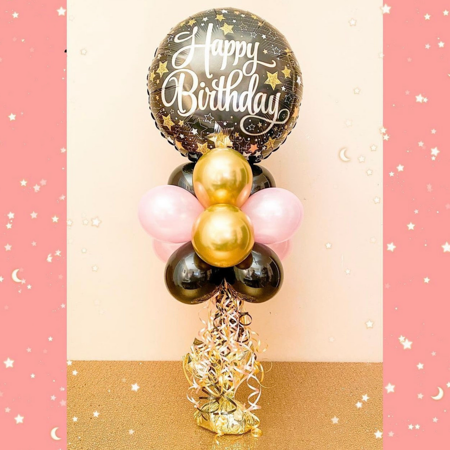 Black and pink table top balloon bouquet