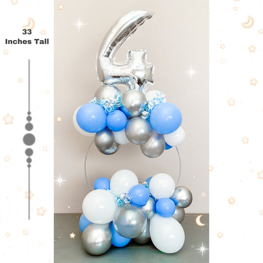 Blue and white aged circle balloon arch